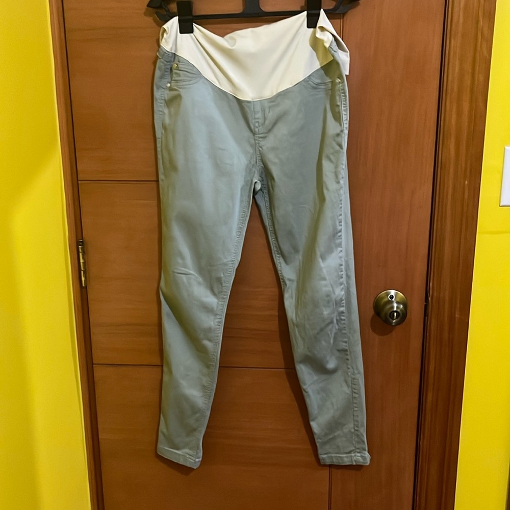 Maternity green skinny pants zipper detail